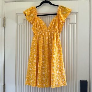 Yellow floral mini dress with open back